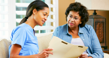 Caregiver and a patient reading